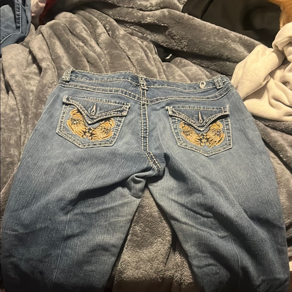 Stylish Blue Jeans with Embroidered Pockets